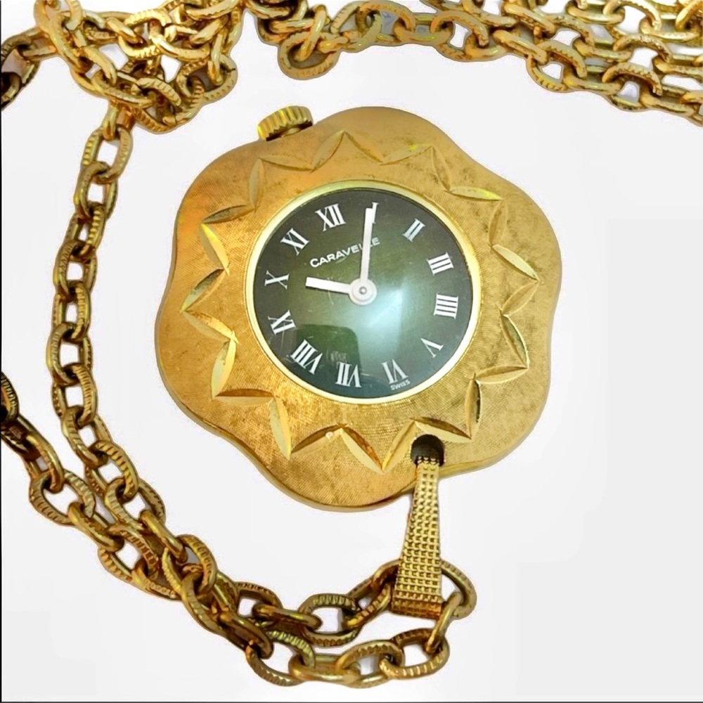 - Vintage eound ornate gold  high finish Caravelle Necklace watch Wind up